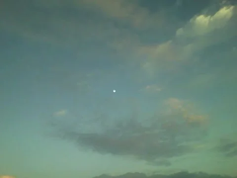 Amazing view of the sun at dusk on the beach, it even looks like a painting Video stock 160232773