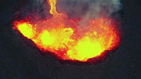 Amazing view of volcanic eruption vent, open crater spitting lava Stock Footage 314666646