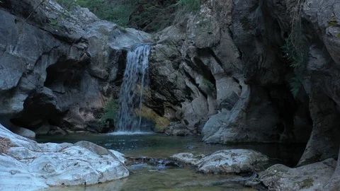 Amazing view of the waterfall in the cave Stock Footage 123895605