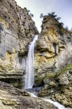 Amazing  waterfall falling down from the hill Stock Photos