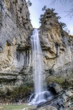 Amazing  waterfall falling down from the hill Stock Photos
