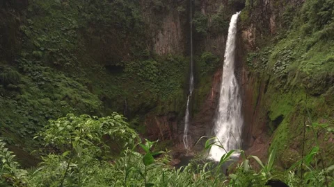 Amazing waterfall inside an extinct volcano, Costa Rica 4K Stock Footage 184583286