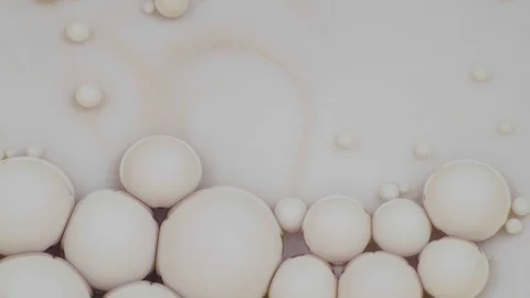 Amazing white and copper bubbles of paint on the oil surface. Paint in oil. Stock Footage 105190597