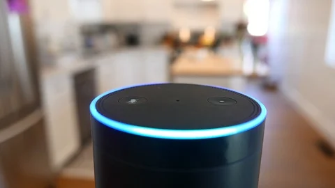 Amazon Alexa / Amazon Echo in Kitchen with blue light.  Editorial clip. Stock Footage 89816682