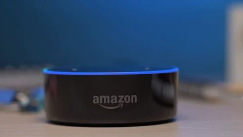 Amazon Alexa Device on a Desk Smart Assistant Panning Shot 스톡 동영상 93565472