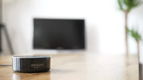 Amazon Alexa Smart Home Device Turning On TV At Home Video stock 126906746