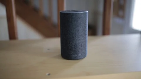 Amazon Alexa on the Wooden Table Stock Footage 99940282