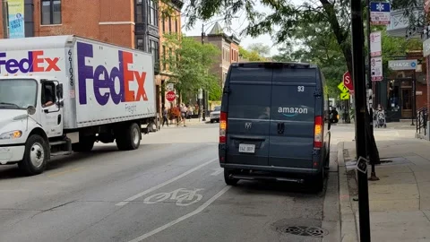Amazon and FedEx Delivery Stock Footage 164562634
