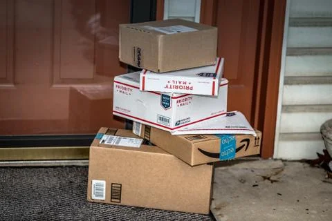Amazon and USPS Packages Stock Photos