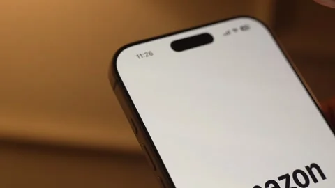 Amazon App Opening on Smartphone Screen Stock Footage 343376306