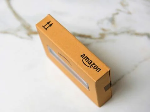 Amazon Branded Package on Marble Stock Photos