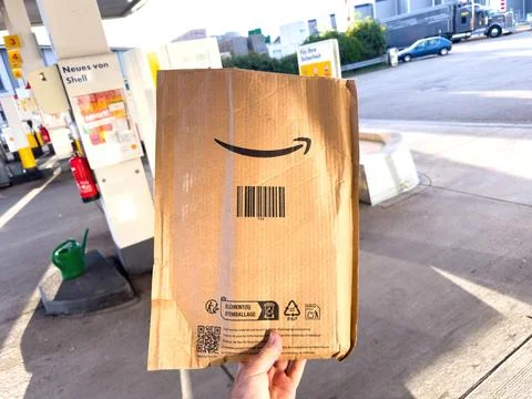 Amazon cardboard package at Shell gas station Stock Photos