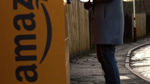 Amazon collection locker point at sunset Stock Footage 229792347