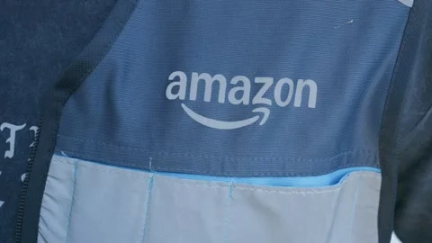 Amazon delivery driver employee vest with Amazon logo on it Stock Footage 332234204