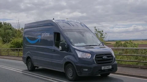 Amazon delivery van on UK countryside road location. York.UK. 6.7.2024 Stock Footage 279090901
