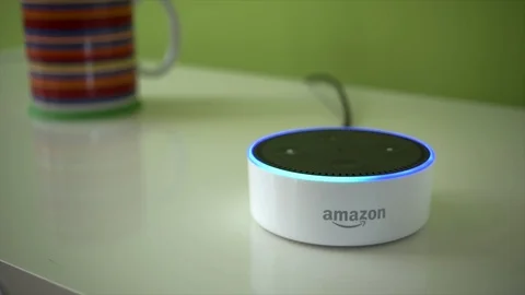 The Amazon Dot Activates It's Light In Response To It's Name Stock Footage 86154034