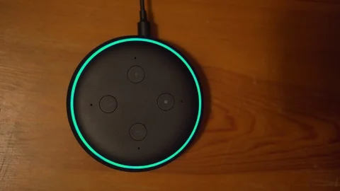 Amazon Echo Dot (3rd Gen) Alexa Activated By Voice Command In Living Room Video stock 104883289