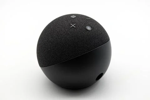 Amazon Echo Dot. Alexa, virtual assistant AI on white. Stock Photos