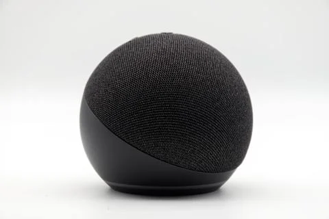 Amazon Echo Dot. Alexa, virtual assistant AI on white. Stock Photos