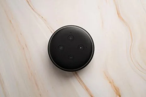 Amazon Echo Dot and Alexa with a marble background. Stock Photos