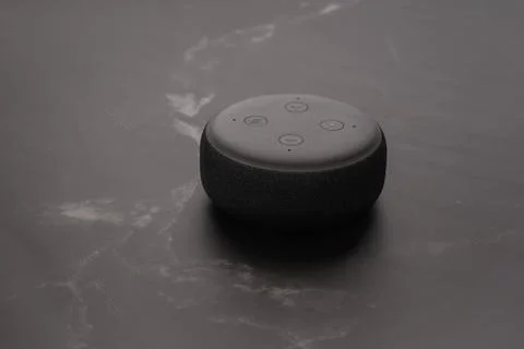 Amazon Echo Dot and Alexa with a marble background. Stock Photos