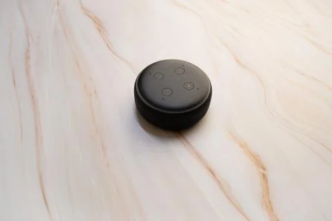 Amazon Echo Dot and Alexa with a marble background. Stock Photos