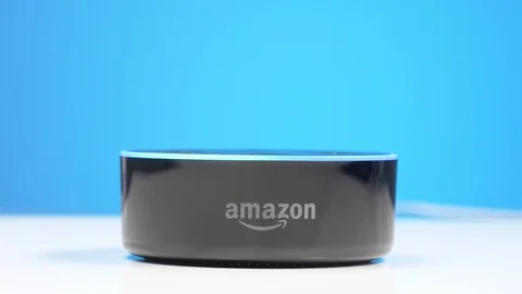 Amazon Echo Dot Smart Home Assistant on a Table Stock Footage 100908812