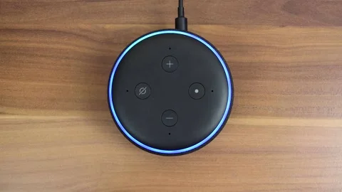An Amazon Echo Dot smart speaker with built-in Alexa voice assistant Video stock 145351327
