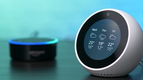 Amazon Echo Spot and Dot Personal Smart Assistant Devices Using Alexa Voice F Video stock 94030811