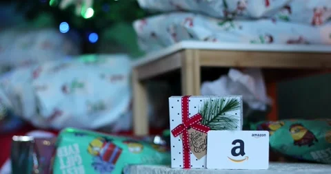 Amazon gift card during the holiday shopping season Stock Footage 228249219