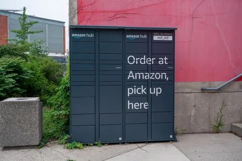 Amazon Hub package locker outside a building. Guelph, Canada - July 17, 2026. Stock Photos
