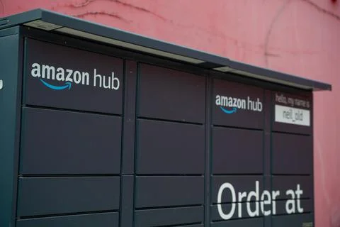 Amazon Hub package locker outside a building. Guelph, Canada - July 17, 2026. Stock Photos