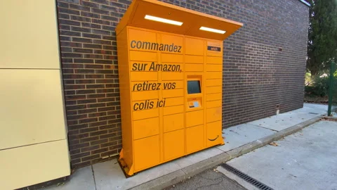 Amazon locker, a self-service package delivery machine by online retailer Amazon Stock Footage 159137259