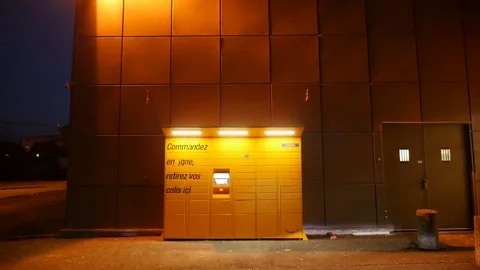 Amazon Locker the self-service parcel delivery service by Amazon.com Stock Footage 72726783