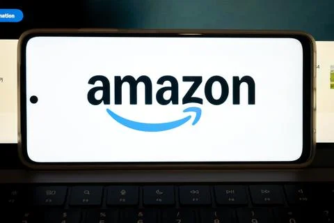 Amazon logo appearing on mobile computing device Fotos Stock