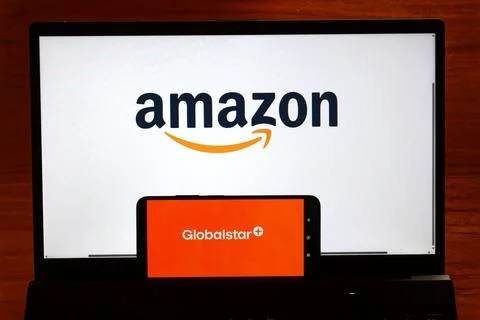 Amazon logo on a laptop screen and Globalstar logo on a smartphone, symboli.. Stock Photos