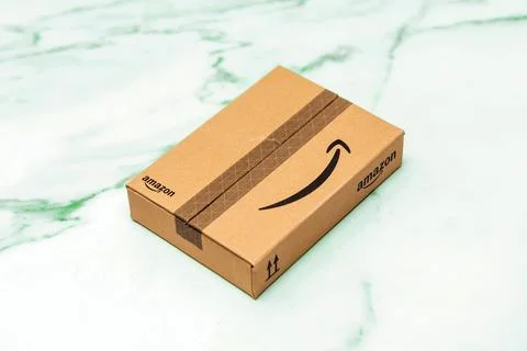 Amazon package on marble surface Stock Photos
