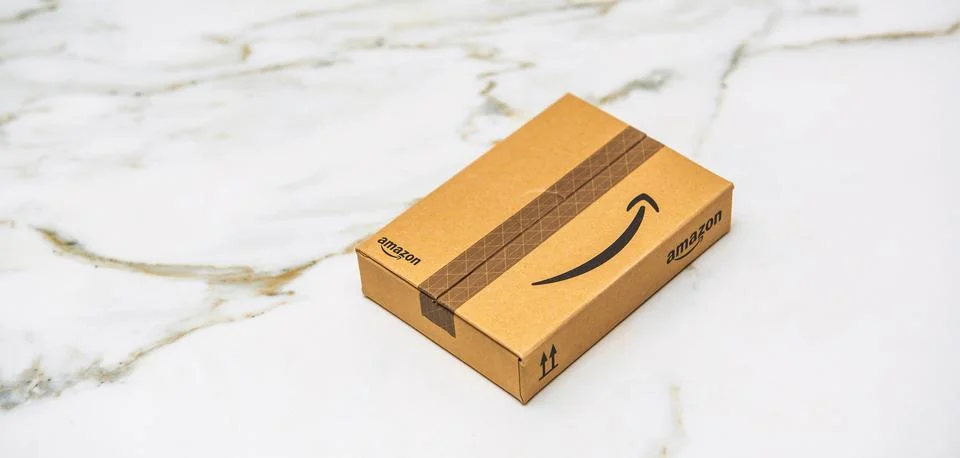 Amazon package on marble surface Stock Photos