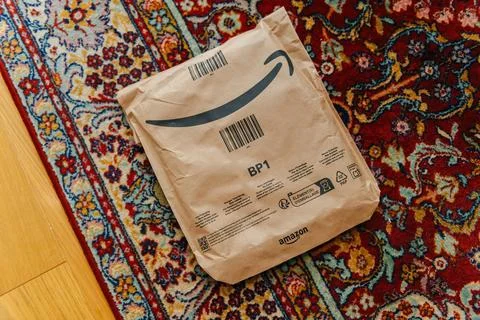 Amazon Package on a Patterned Carpet Stock Photos