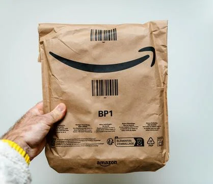 Amazon Paper Packaging Held in Hand Stock Photos