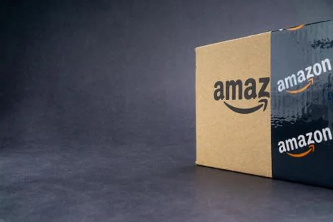 Amazon Prime box or Amazon shipping box on black background 스톡 사진