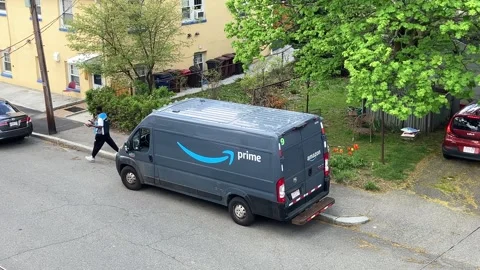 Amazon Prime brings package to customer, Revere Mass. USA May 7 2026 Stock Footage 342666541