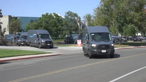 Amazon Prime delivery vans going on delivery. Stock Footage 160573476