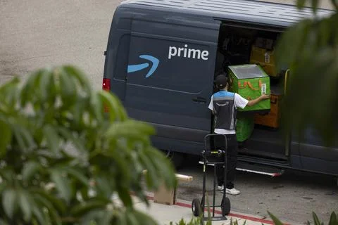 Amazon Prime Delivery Worker Stock Photos