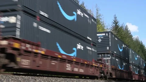 Amazon Prime intermodal container freight passing on train in closeup 스톡 동영상 276235267