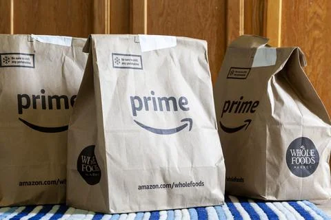 Amazon Prime offers same day free delivery for Whole Foods Stock Photos