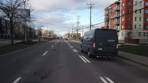 Amazon Prime Van on Boulevard St-Jean Stock Footage 229953902