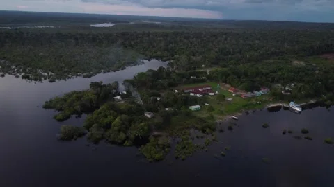 Amazon Rainforest Settlements and Indigenous Communities Seen by Drone Stock Footage 336910354