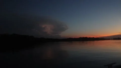 The Amazon river - sunset and lightning Stock Footage 279194252