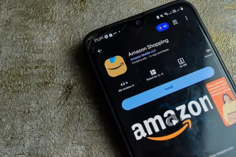 Amazon shopping dev application on Smartphone screen. Stock Photos